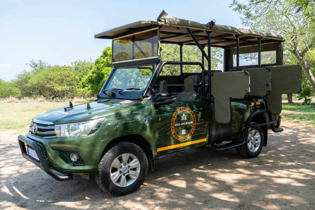 Game drive vehicle in Kruger National Park for safari tours.